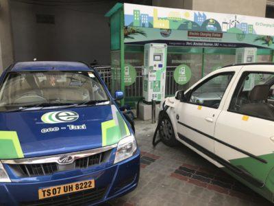 Two e-vehicles charging batteries